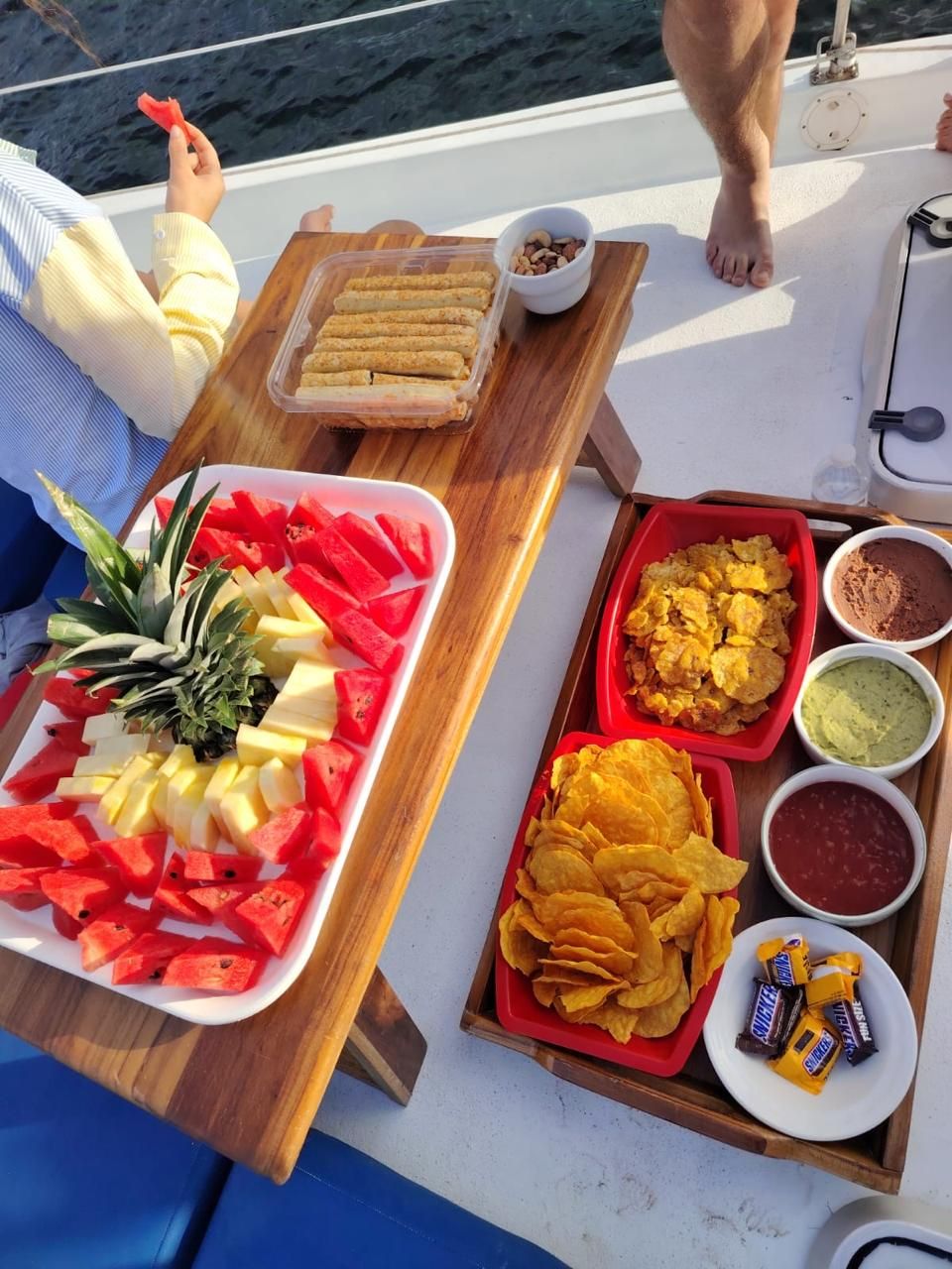 Fresh fruit, plantain chips, guacamole, and salsas on deck